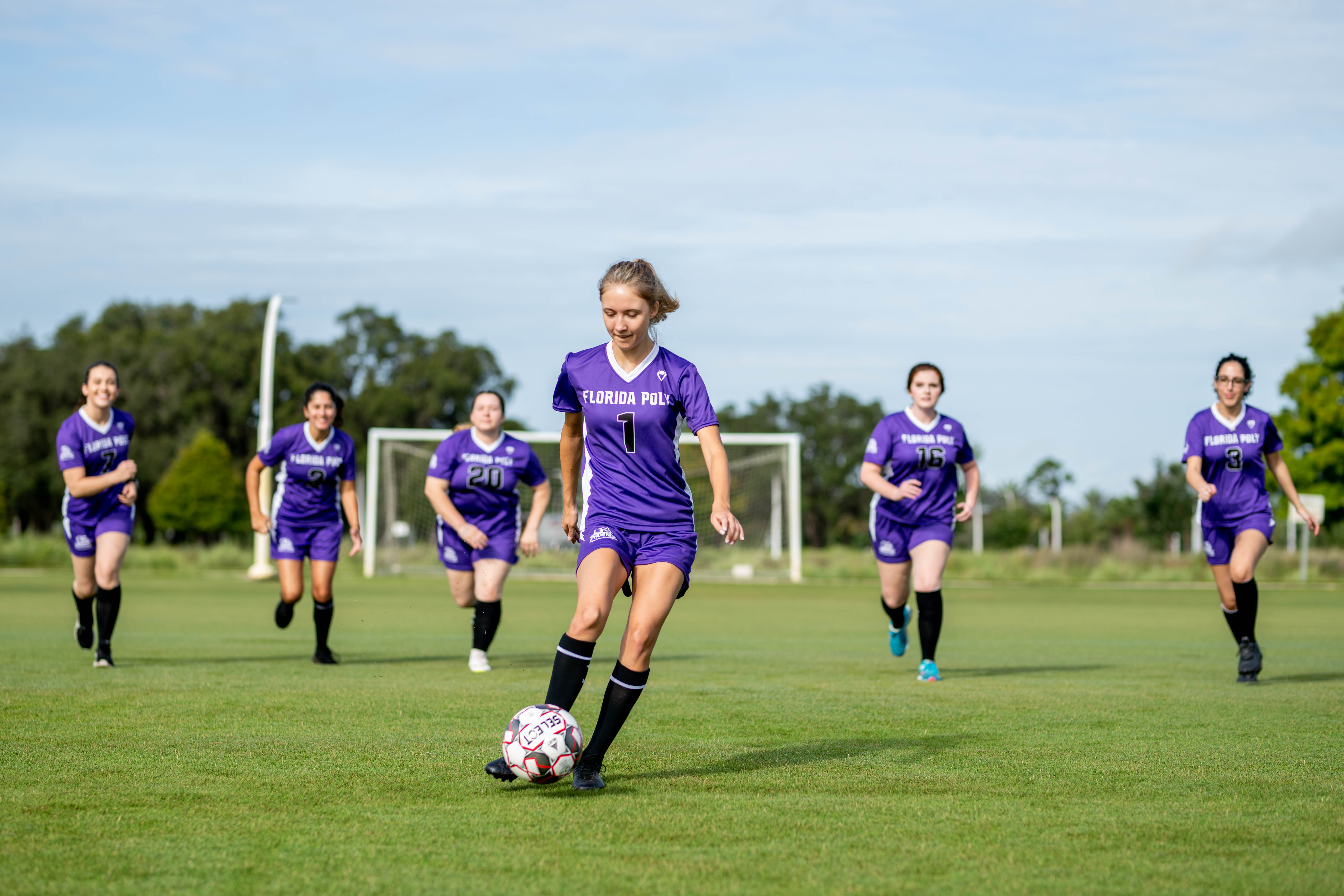 women playing soccer