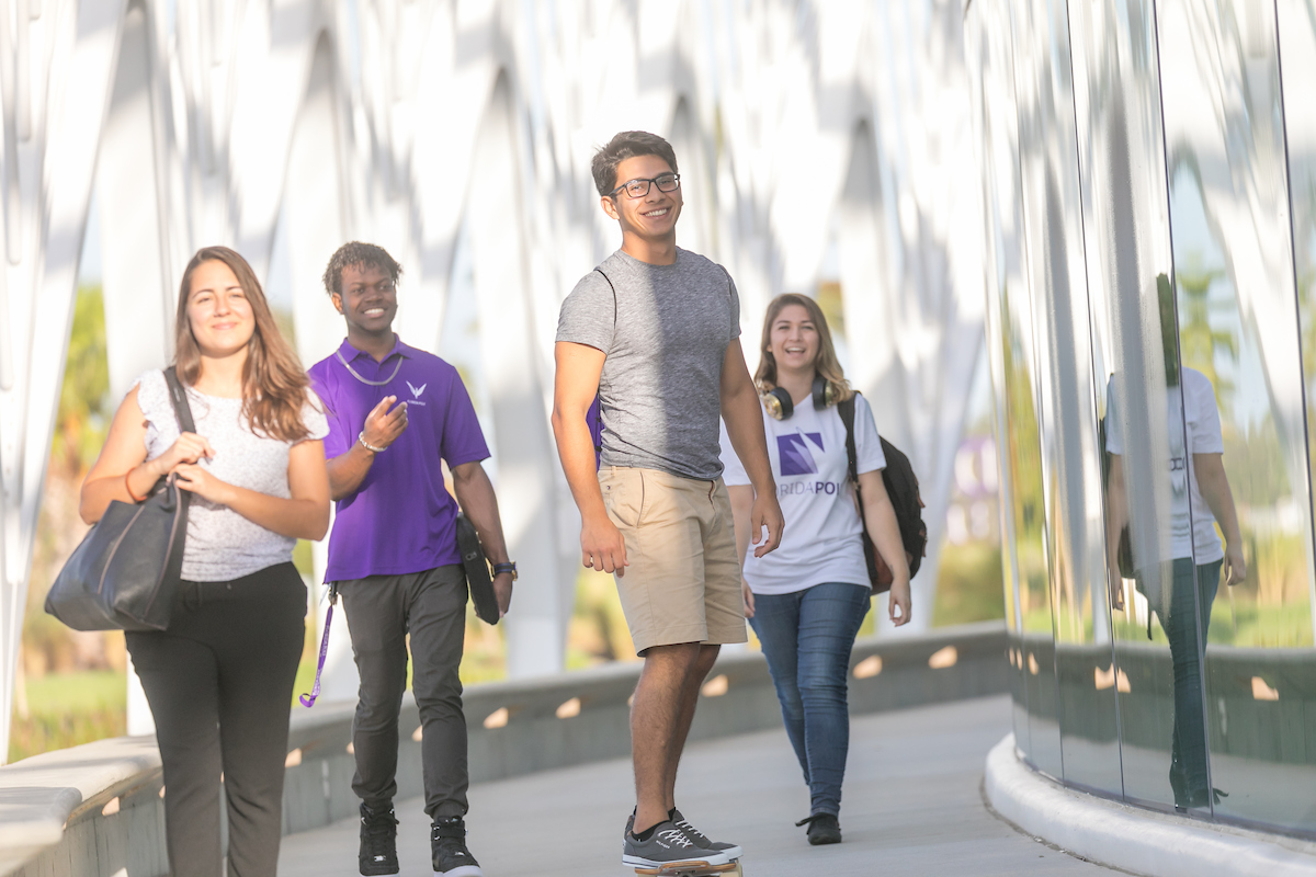 students walking around the IST Building