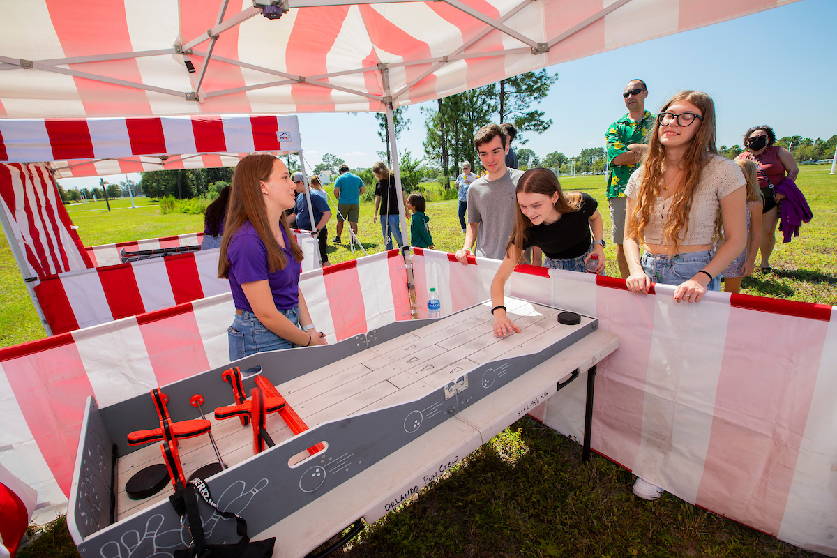 family playing carnival game