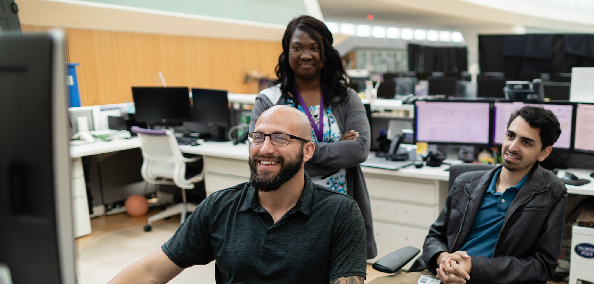 Help desk employees working.